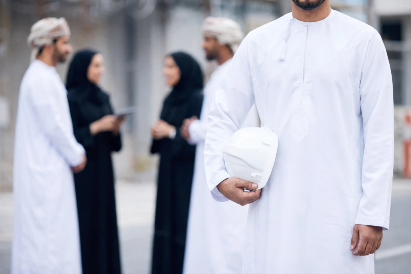 Team of professionals in safety gear, highlighting workplace safety and operational standards.